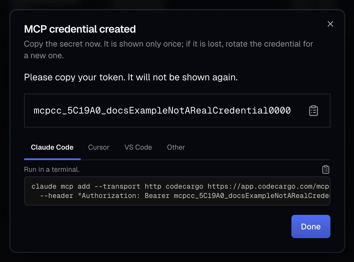 The MCP credential created dialog: a note to copy the secret now, the secret with a copy button, and Claude Code, Cursor, VS Code and Other tabs, with the Claude Code command that adds CodeCargo's MCP endpoint using the secret as a bearer token